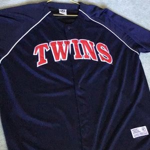 Men’s Twins short sleeve shirt.  100% polyester.